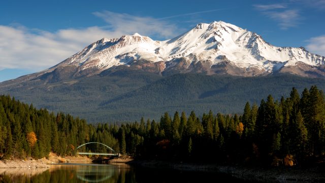 Mount Shasta rising above Shasta Lake in the Sierra National Forest