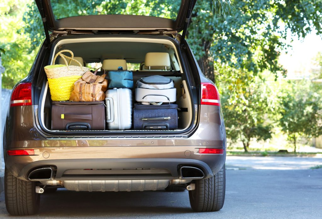 Luggage packed into hire car