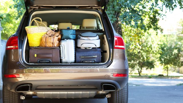 Luggage packed into hire car