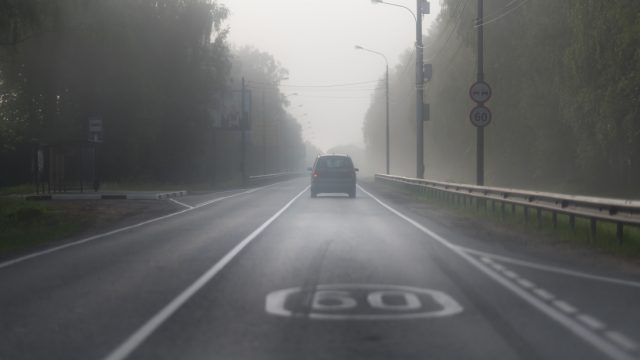 car driving in fog