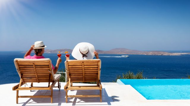 couple by swimming pool