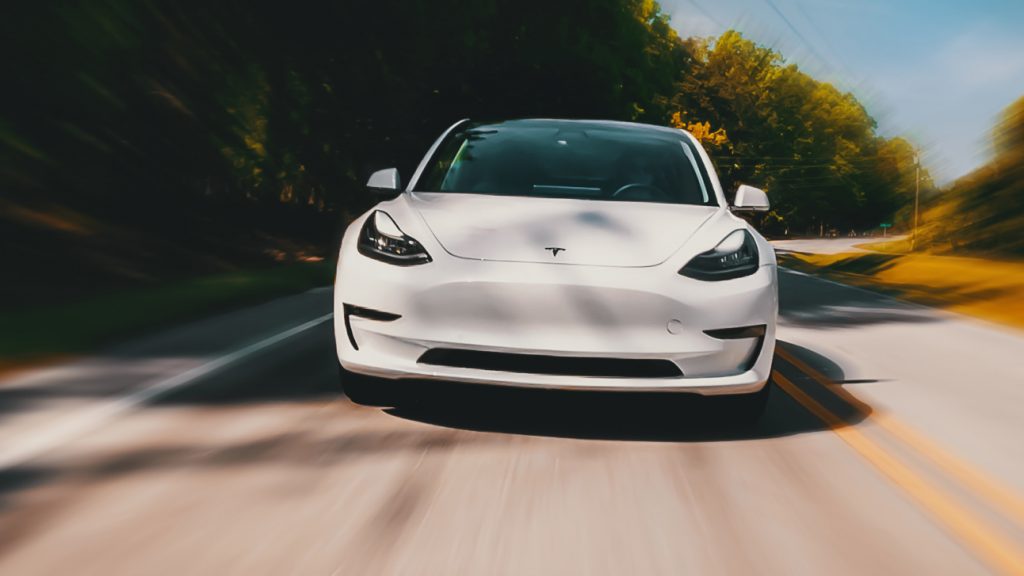 tesla driving on road